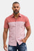 KIOKO Cityboy colorblock short-sleeve shirt in two-tone pink worn by a man with a beard against a white background.