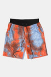 KIOKO Cypher tie-dye jogger shorts in red and blue cotton with a black elastic drawstring waistband.