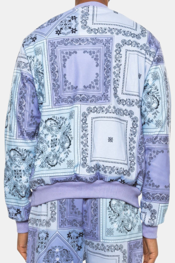 Back view of KIOKO lavender paisley bandana print crewneck sweatshirt with ribbed cuffs and cotton blend fabric.