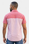 Back view of a man wearing a KIOKO Cityboy short-sleeve colorblock shirt in two-tone pink cotton blend
