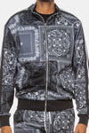 KIOKO Crenshaw Paisley Bandana Track Jacket in black with a full-zip front and all-over white paisley print pattern.