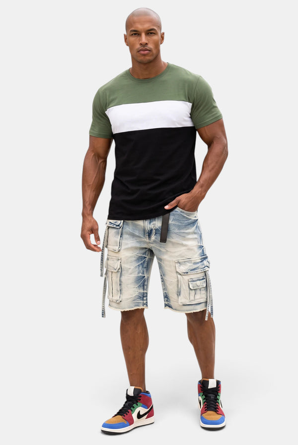 KIOKO Eastside colorblock t-shirt in olive, white, and black worn by a model with denim cargo shorts and sneakers.